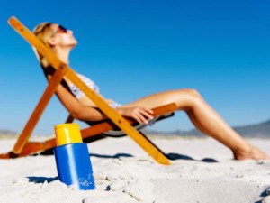 TS-142336641-sun-tanning-beach-sunscreen-600x450